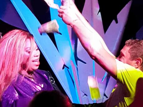 Man and drag queen dancing at gay club 801 bourbon in Key West