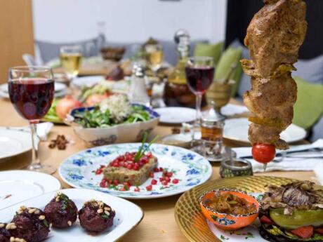 A table piled high with yummy Greek food at A Little Taste of Home restaurant in Athens.