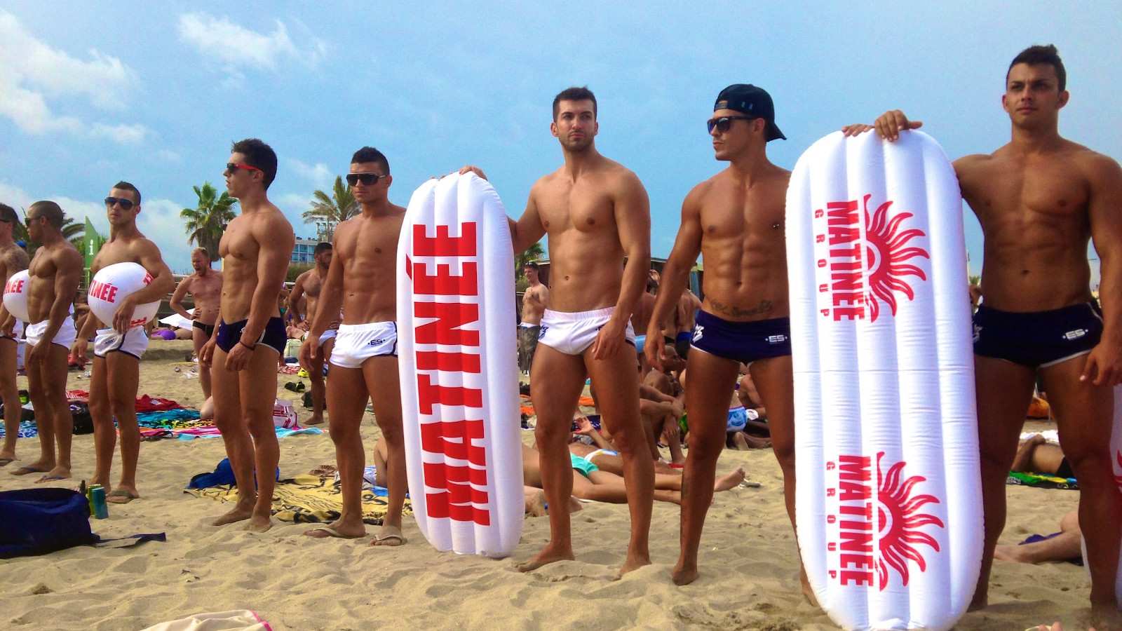 Hot boys, on Mar Bella beach, Barcelona one of the gayest cities in Spain