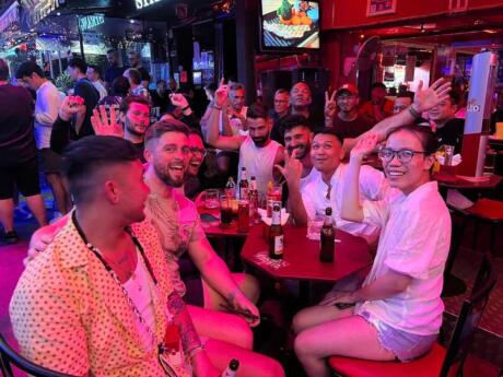 Seby and Stefan having drinks with new friends at Circus gay bar in Bangkok.