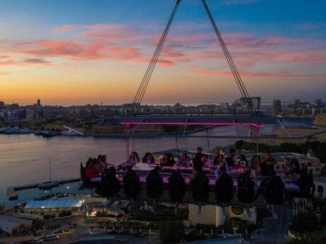 For a truly unforgettable dining experience, you can eat a decadent seven course meal while suspended from a crane on Malta's Dinner in the Sky