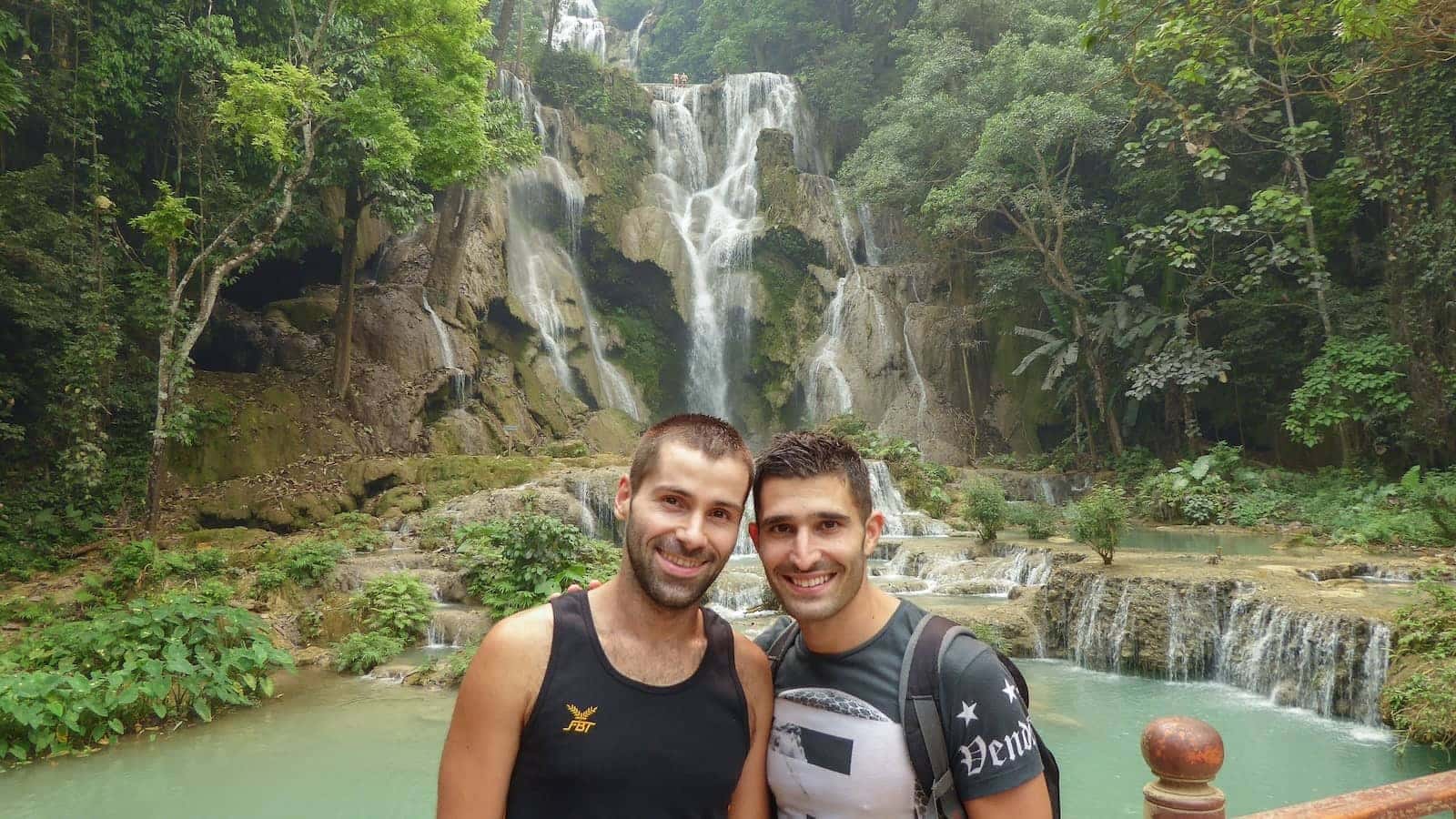 Gay couple at the Kuang Si Falls in Luang Prabang in Laos.