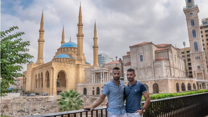 Gay couple in front of Mohammad Al Amin Mosque in Beirut.