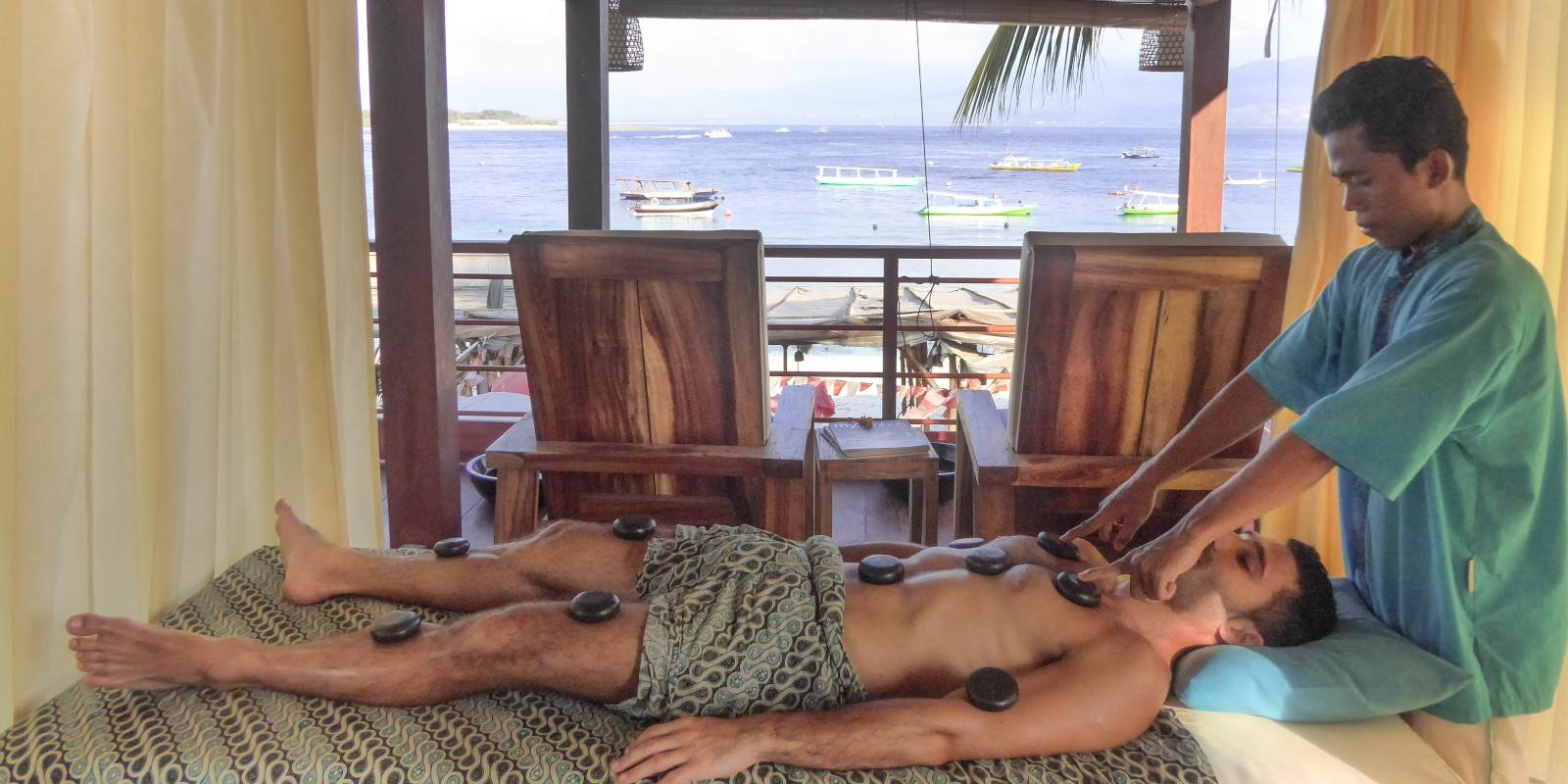 A hot stone massage in gay friendly spa massage on Gili Trawangan