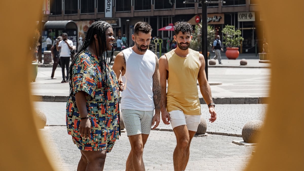 Gay couple walking with Sebo gay local from Johannesburg.