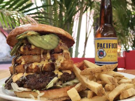 After a night of partying at Puerto Vallarta's gay clubs you should try one of the best (and hugest) burgers in town at Derby City Burgers!