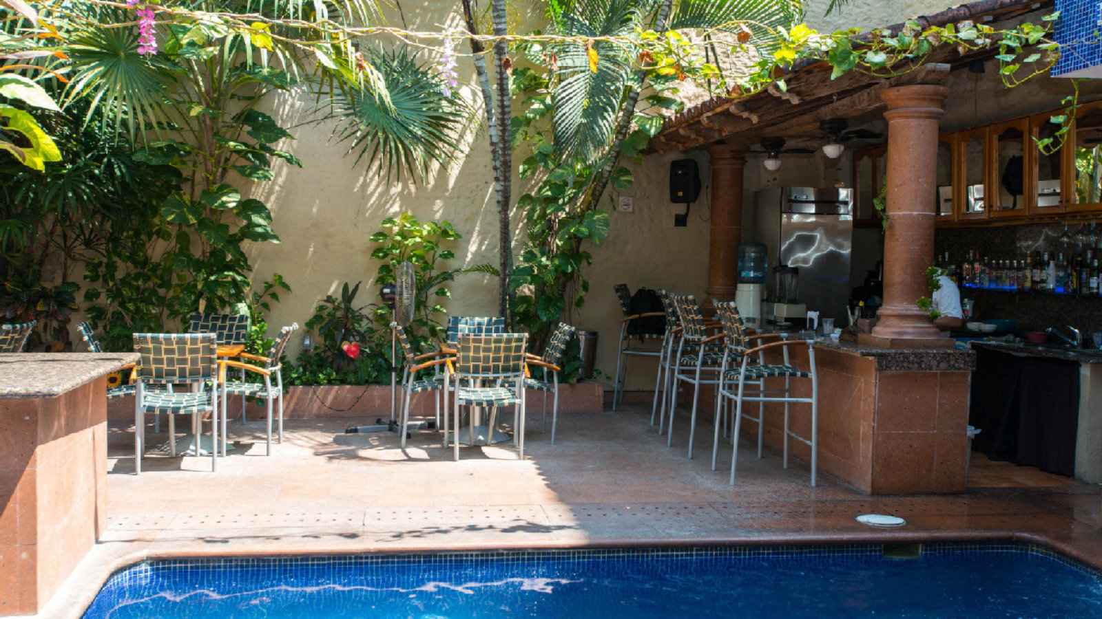 The cute pool at Mercurio Hotel hosts fun gay pool parties in Puerto Vallarta.