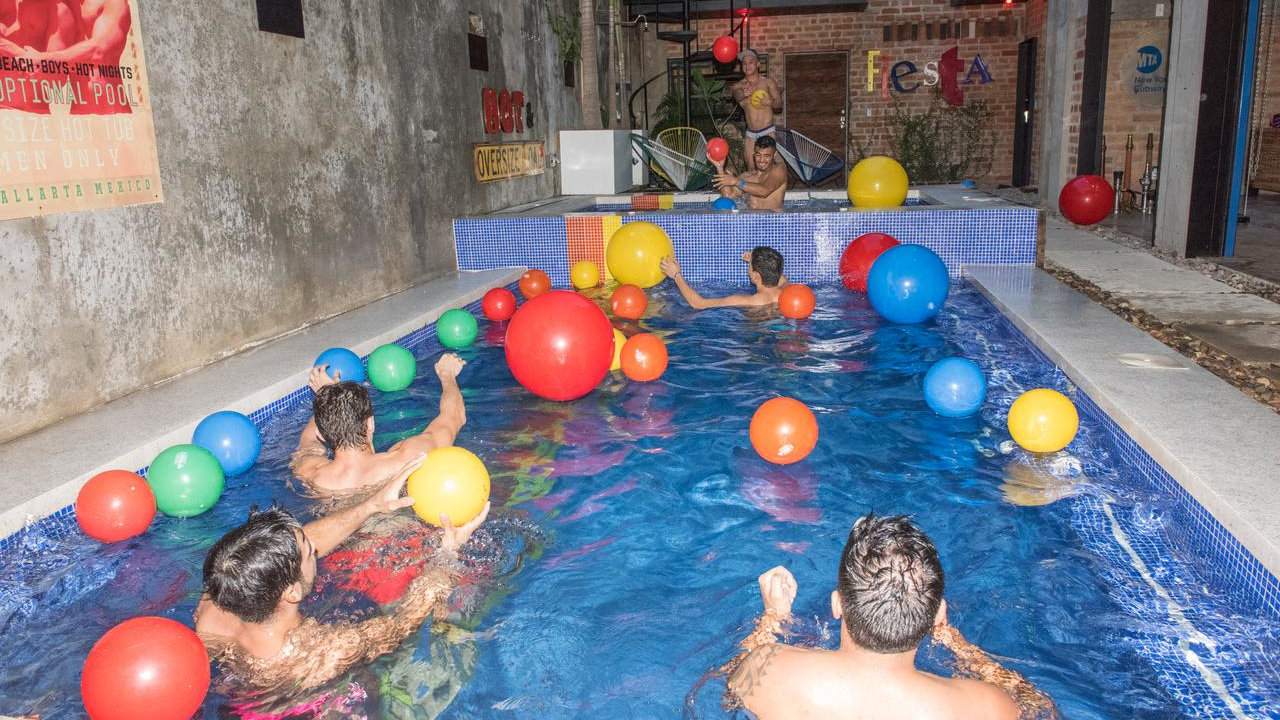 Gay accommodation in Puerto Vallarta - the male-only Pinata PV Gay Hotel is the place to be for fun clothing-optional pool parties!