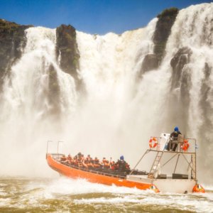 A boat ride under the falls is a thrilling way to experience these incredible cascades.