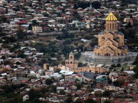 The Holy Trinity Cathedral in Tbilisi is the third-largest church in the world and a must-see while you're in the country