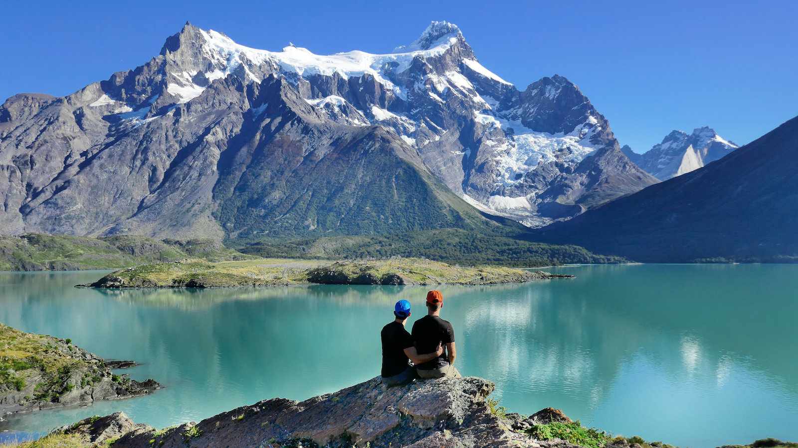 Gay couple at the Torres Del Paine National Park in Patagonia, Chile.