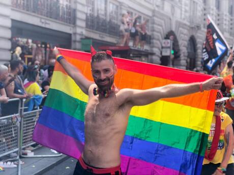 Show your gay Pride by wrapping up in a giant rainbow flag!