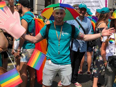 Keep the sun or rain away with a rainbow umbrella, perfect for any weather at pride.