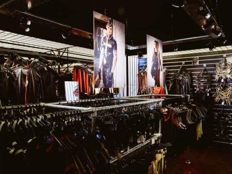 Clothes hanging inside REGULATION, a gay store in London.