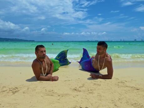 Nomadic Boys posing as gay mermaids on Boracay islands in the Philippines