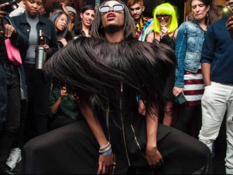 A fierce diva in black clothes getting down in front of a crowd at Tennis Club in Johannesburg.